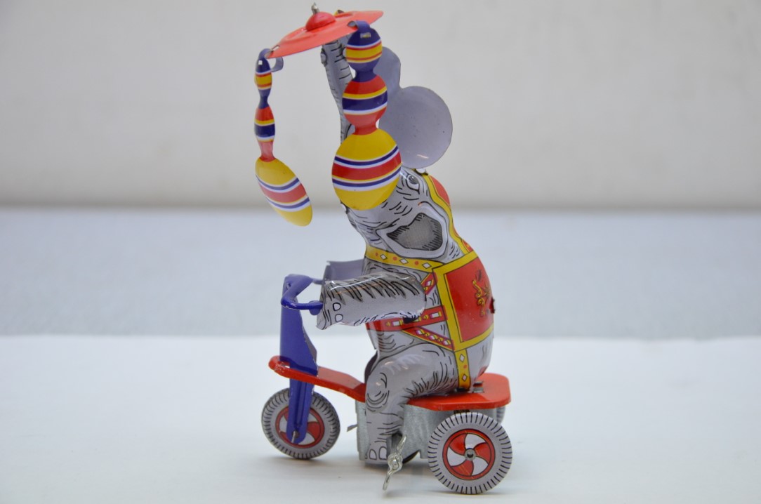 Tinnen speelgoed: Olifant op de fiets – in doos